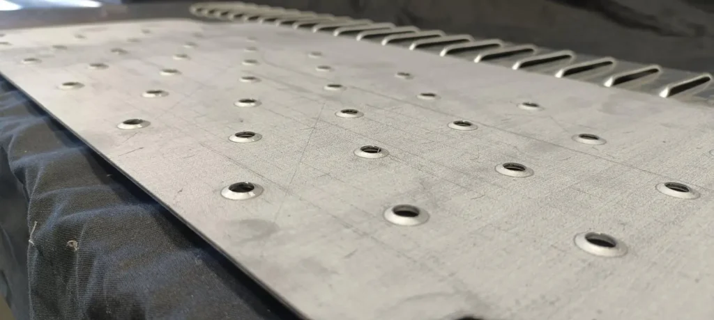 Turret punch forming work by our service